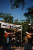 Webb, Joe McMahan, Steve Ebe, and Tom Comet on stage, Mississippi Heritage Festival at the Jackson Zoo.